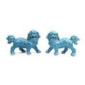A pair of modern Chinese turquoise glazed figures, modelled as Buddhistic lion dogs, 16.5 by 7 by 11... 