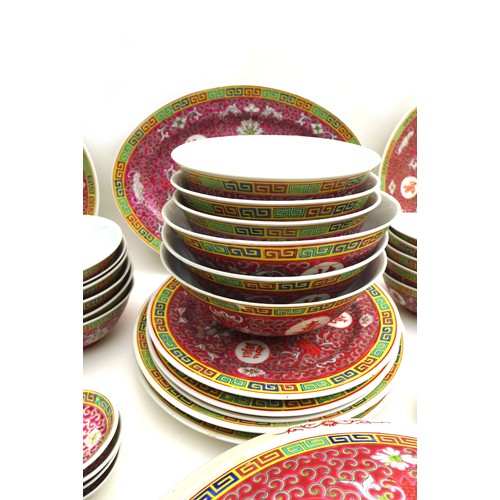 10 - A collection of Chinese ceramics, late 20th century, including serving bowls, a lidded bowl, tea bow... 
