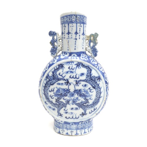 30 - A group of three Chinese items, comprising a blue and white moon flask vase, with twin handles, 21.5... 
