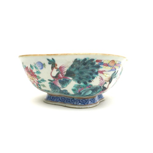 48 - A Chinese porcelain pedestal bowl, of four lobed form, decorated with floral sprays and peacocks, fo... 