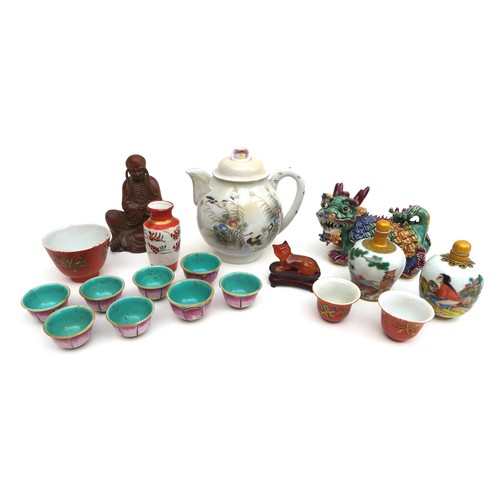 22 - A collection of Chinese and Japanese ceramics, including eight small lotus flower form tea bowls, la... 