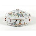 A Chinese porcelain box and cover, probably 19th century, of squat cylindrical form, with four small... 