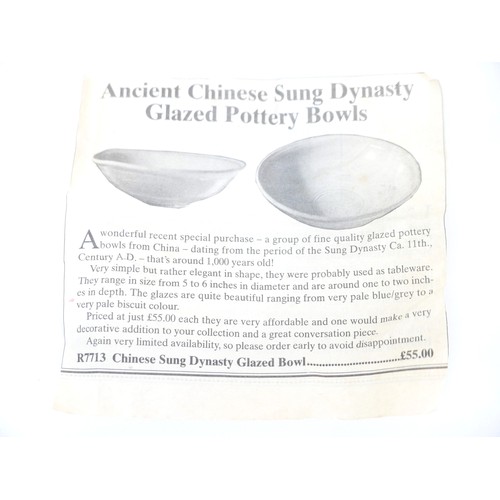 55 - A Chinese Song Dynasty pottery bowl, 14.5 by 4cm high, with newspaper excerpt.