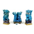 A pair of 18th century Chinese porcelain turquoise glazed figures, a mirrored pair, each modelled as... 