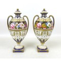A pair of Royal Crown Derby Albert Gregory lidded vases, of bulbous form, painted with a border of f... 