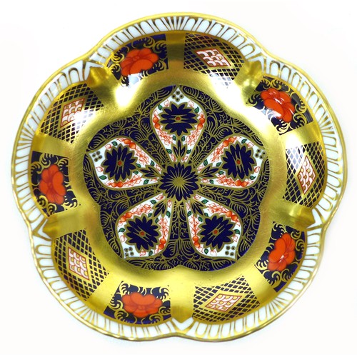 53 - A set of four Royal Crown Derby Imari dishes, 1128, with scalloped edges and richly gilded, 11 by 11... 