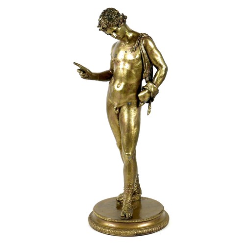 A late 19th century gilt bronze sculpture, after the Antique, modelled as Emperor Hadrian's lover Antinous in a nude standing pose, lost wax (cire perdue) process, depicted in fine detail wearing a grape decorated wreath upon his head, a goat skin, the small horns and cloven feet visible, draped over his left shoulder, high lacing sandals upon his feet with toes exposed, with hollow eyes possibly previously fitted with precious stones, raised upon a circular base with stiff leaf borders, with cast mark for 'Bellman & Ivery, 37 Piccadilly, London, By Appointment to the Queen', base 24cm, figure 58cm high, 62cm high overall.