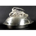 A large late 20th century Franco Lagini silver plated Seafood platter, its domed cover mounted by a ... 