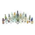 An assortment of vintage glass and stoneware bottles, including Trealaw Rhonda Valley Aerated Water ... 