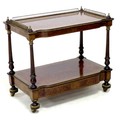 A Victorian burr walnut veneered two tier whatnot, boxwood strung, and with gilt metal galleried top... 