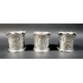 Three Victorian silver vases, comprising a pair, James Dixon & Sons Ltd. Sheffield 1899, and another... 