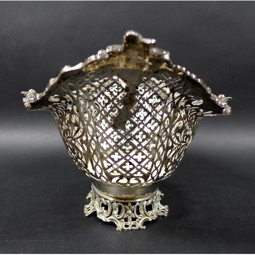 113 - A Edwardian silver centrepiece, with scroll and foliate decorative rims and pierced decoration to it... 