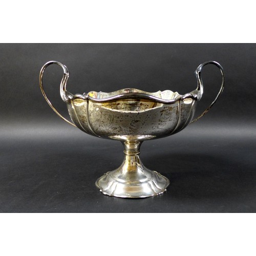 114 - A George V silver twin handled fruit bowl, raised upon base, Manoah Rhodes & Sons Ltd. Sheffield 192... 