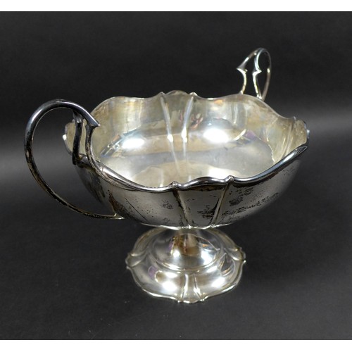 114 - A George V silver twin handled fruit bowl, raised upon base, Manoah Rhodes & Sons Ltd. Sheffield 192... 