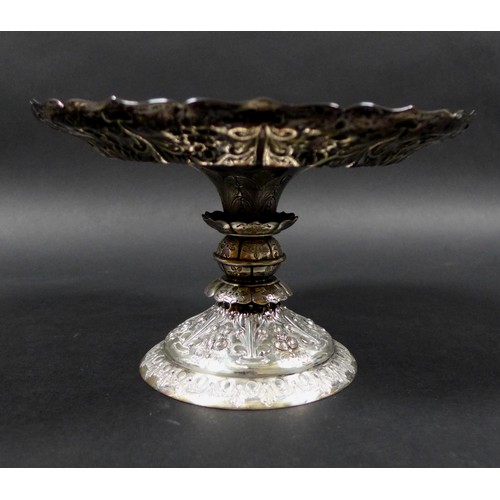 82 - A Victorian silver tazza, of circular form with profuse raised foliate decoration raised upon a step... 