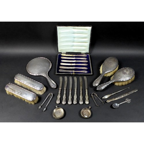 40 - A collection of George V silver and later silver, including a George V silver backed hand mirror 27c... 