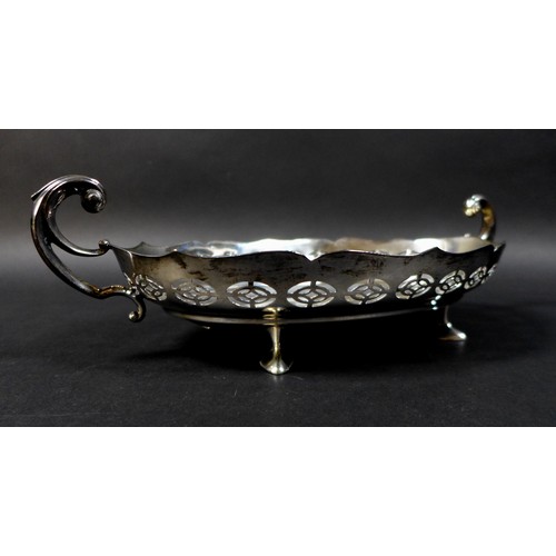 65 - Three pieces of 19th century white metal, comprising a 1950s white metal twin handled serving dish, ... 