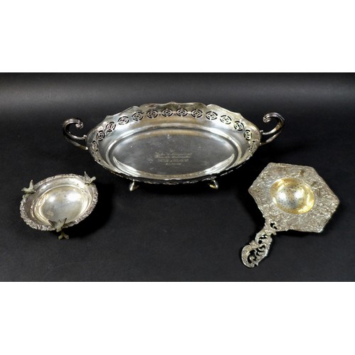 65 - Three pieces of 19th century white metal, comprising a 1950s white metal twin handled serving dish, ... 