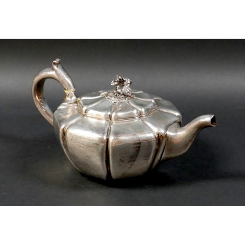 112 - A Regency silver teapot, of lobed form with flower head finial, ivory insulators, 12cm high, 17.7toz... 