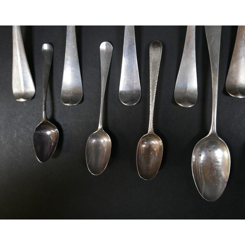 103 - A collection of Georgian silver table and tea spoons, some with shell, flame, and rat tail bowls, va... 