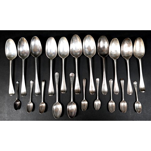 103 - A collection of Georgian silver table and tea spoons, some with shell, flame, and rat tail bowls, va... 