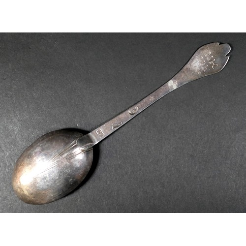 104 - An early 18th century silver trefid spoon, terminal engraved ‘MK MK 1720’ with oval bowl, 34.1g, 19.... 