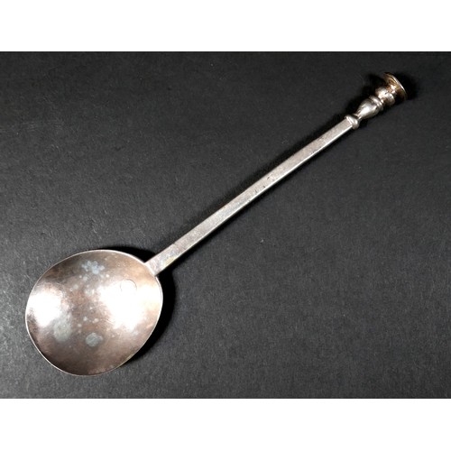 105 - A 17th century silver seal top spoon, prick engraved finial, with circular bowl, 39.2g, 16.3cm long.