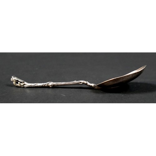 106 - A 17th century silver shield finial and scroll stemmed spoon, possibly Dutch, with oval bowl engrave... 