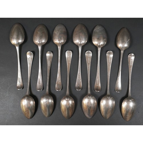 109 - A collection of twelve Georgian silver table spoons, Hanoverian and Old English patterns, terminal e... 