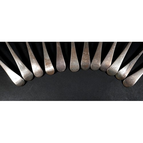 109 - A collection of twelve Georgian silver table spoons, Hanoverian and Old English patterns, terminal e... 