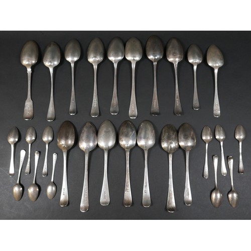 119 - A group of seventeen Georgian silver table spoons, Hanoverian and one Fiddle pattern, most with engr... 