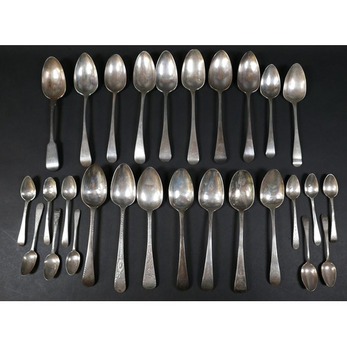 119 - A group of seventeen Georgian silver table spoons, Hanoverian and one Fiddle pattern, most with engr... 