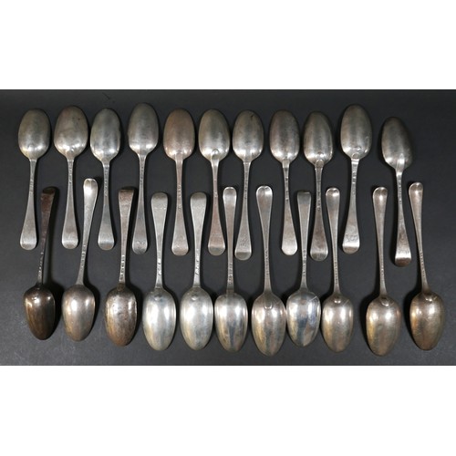 128 - A collection of Georgian and later silver table spoons, mostly Hanoverian pattern, some terminal eng... 