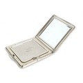An Elizabeth II silver compact mirror, by Kigu of London, of square form with engraved decoration, t... 