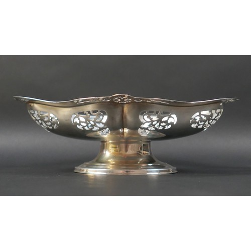 71 - A silver pedestal dish, with pierced decoration, 29 by 22 by 8.5cm high, 15.95toz.