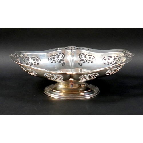 71 - A silver pedestal dish, with pierced decoration, 29 by 22 by 8.5cm high, 15.95toz.