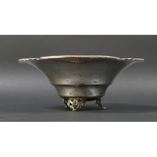 13 - A silver bowl, with decorative rim, raised on three pierced feet, 19 by 8cm high, 4.98toz.