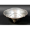 A silver bowl, with decorative rim, raised on three pierced feet, 19 by 8cm high, 4.98toz.