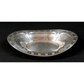 A silver dish, of boat form with pierced decoration, 28 by 17.5 by 5cm high, 5.3toz.