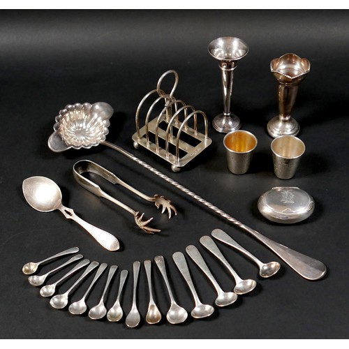 72 - A group of silver items, comprising various small salt and mustard spoons, a small toast rack, Mappi... 