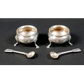 A pair of Victorian silver salts, of cauldron form with beaded rims, raised on three hoof feet, each... 