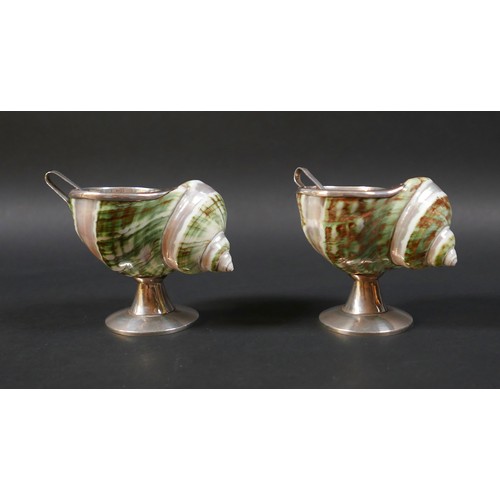 95 - An unusual pair of novelty salts, formed from decorative seashells, each mounted with a white metal ... 