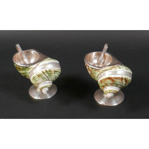 95 - An unusual pair of novelty salts, formed from decorative seashells, each mounted with a white metal ... 