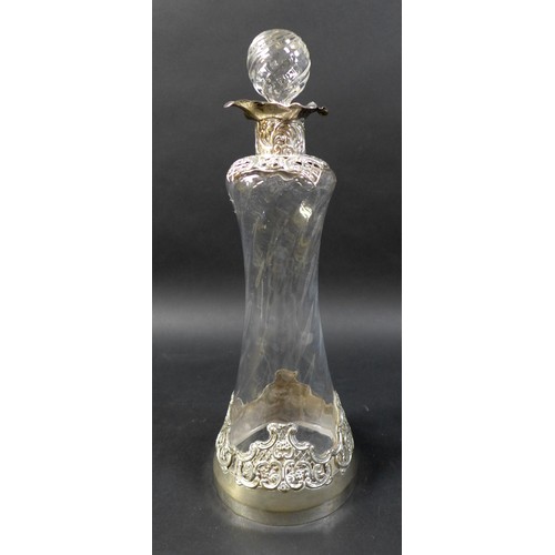 54 - A Victorian decanter and stopper with silver applied scroll work, William Comyns & Sons, London 1904... 
