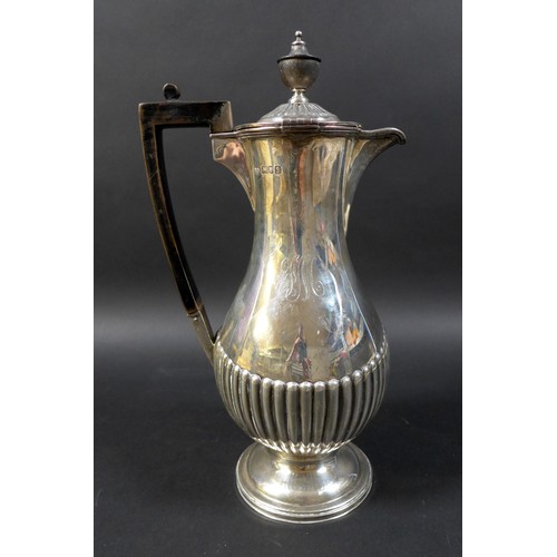 93 - An Edwardian coffee pot with ebonised handle and finial, 'JM' monogram inscribed to side, The Goldsm... 