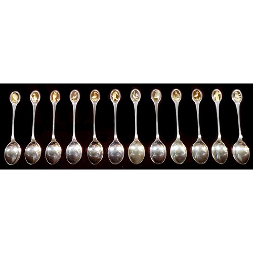 117 - Two cased sets of twelve silver spoons for the RHS and RSPB, RHS set with flower deisgns hallmarked ... 