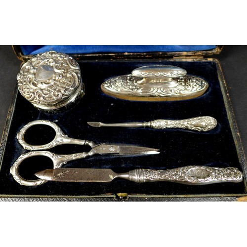 14 - Five silver manicure items in an associated box, four by S Blanckensee & Son Ltd marked Chester and ... 