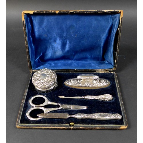 14 - Five silver manicure items in an associated box, four by S Blanckensee & Son Ltd marked Chester and ... 