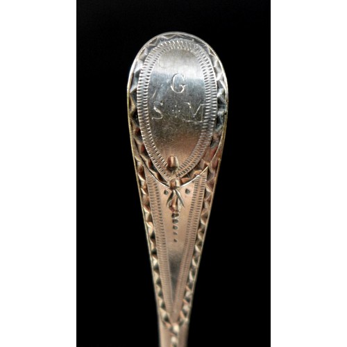 86 - A set of six George III bright cut silver teaspoons, Old English pattern, 'G S M' monogram to top, i... 