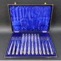 A cased set of six fish knives and six fish forks, Queens pattern, silver handles marked Yates Broth... 